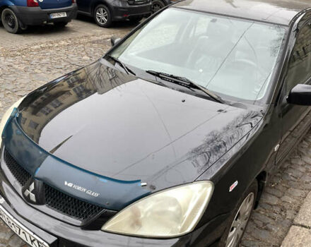 Чорний Міцубісі Lancer, об'ємом двигуна 1.6 л та пробігом 213 тис. км за 3000 $, фото 1 на Automoto.ua