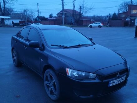Черный Мицубиси Лансер, объемом двигателя 1.5 л и пробегом 220 тыс. км за 4700 $, фото 1 на Automoto.ua