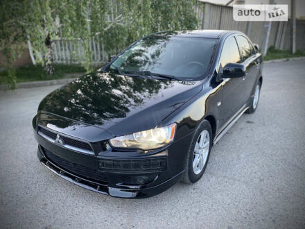 Чорний Міцубісі Lancer, об'ємом двигуна 2 л та пробігом 214 тис. км за 6600 $, фото 1 на Automoto.ua