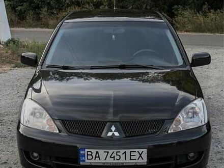 Чорний Міцубісі Lancer, об'ємом двигуна 1.6 л та пробігом 226 тис. км за 4800 $, фото 1 на Automoto.ua