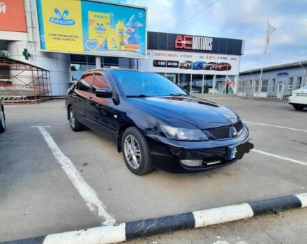 Чорний Міцубісі Lancer, об'ємом двигуна 1.6 л та пробігом 204 тис. км за 4200 $, фото 1 на Automoto.ua