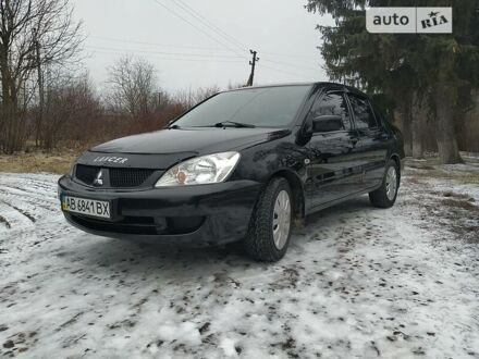 Чорний Міцубісі Lancer, об'ємом двигуна 1.6 л та пробігом 190 тис. км за 5000 $, фото 1 на Automoto.ua