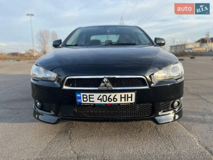 Чорний Міцубісі Lancer, об'ємом двигуна 2 л та пробігом 193 тис. км за 7500 $, фото 1 на Automoto.ua