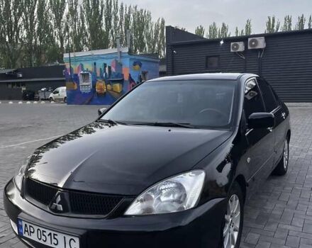 Чорний Міцубісі Lancer, об'ємом двигуна 1.58 л та пробігом 203 тис. км за 5500 $, фото 1 на Automoto.ua