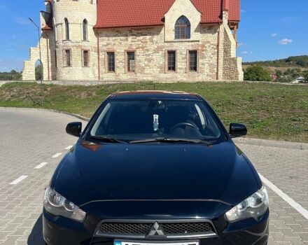 Чорний Міцубісі Lancer, об'ємом двигуна 2 л та пробігом 218 тис. км за 6000 $, фото 1 на Automoto.ua