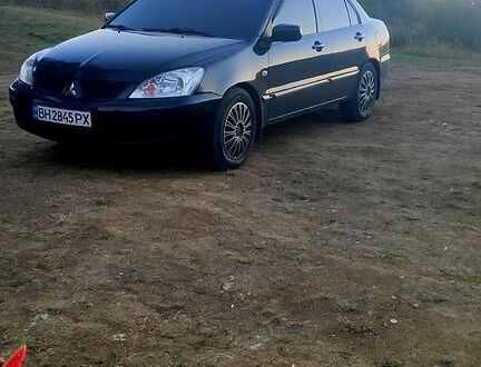 Міцубісі Lancer 2007 у Могилев-Подольском на Automoto.ua Чорний Міцубісі Lancer, об'ємом двигуна 1.6 л та пробігом 208 тис. км за 4200 $, фото 1 на Automoto.ua