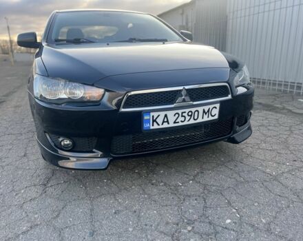 Чорний Міцубісі Lancer, об'ємом двигуна 2 л та пробігом 170 тис. км за 7900 $, фото 1 на Automoto.ua