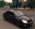 Чорний Міцубісі Lancer, об'ємом двигуна 1.6 л та пробігом 126 тис. км за 6450 $, фото 1 на Automoto.ua