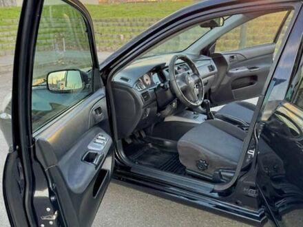 Мицубиси Лансер 2007 в Лубнах на Automoto.ua Черный Мицубиси Лансер, объемом двигателя 1.6 л и пробегом 280 тыс. км за 4250 $, фото 1 на Automoto.ua