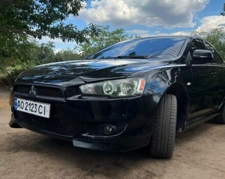 Черный Мицубиси Лансер, объемом двигателя 2 л и пробегом 240 тыс. км за 5500 $, фото 1 на Automoto.ua