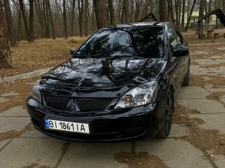 Мицубиси Лансер 2007 в Полтаве на Automoto.ua Черный Мицубиси Лансер, объемом двигателя 1.6 л и пробегом 340 тыс. км за 5100 $, фото 1 на Automoto.ua