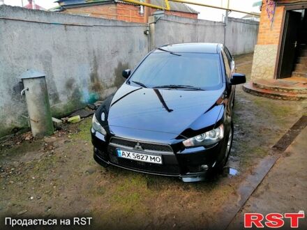 Міцубісі Lancer 2007 у Богодухове на Automoto.ua Чорний Міцубісі Lancer, об'ємом двигуна 2 л та пробігом 228 тис. км за 7200 $, фото 1 на Automoto.ua