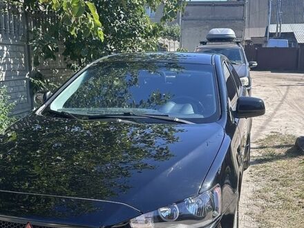 Черный Мицубиси Лансер, объемом двигателя 2 л и пробегом 258 тыс. км за 6107 $, фото 1 на Automoto.ua