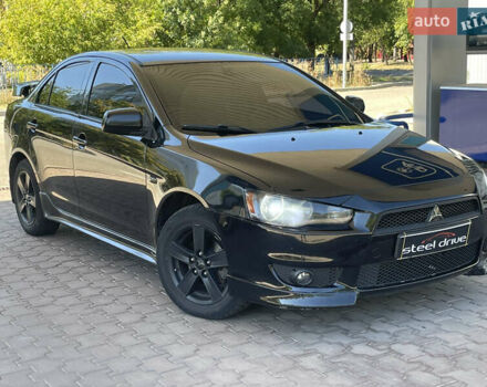 Чорний Міцубісі Lancer, об'ємом двигуна 2 л та пробігом 240 тис. км за 6999 $, фото 1 на Automoto.ua