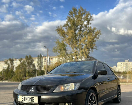 Чорний Міцубісі Lancer, об'ємом двигуна 2 л та пробігом 280 тис. км за 4600 $, фото 1 на Automoto.ua