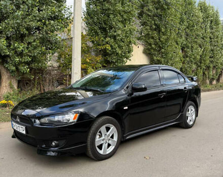 Чорний Міцубісі Lancer, об'ємом двигуна 2 л та пробігом 221 тис. км за 6500 $, фото 1 на Automoto.ua