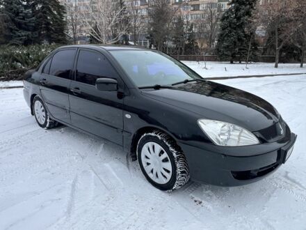 Чорний Міцубісі Lancer, об'ємом двигуна 1.6 л та пробігом 260 тис. км за 3999 $, фото 1 на Automoto.ua