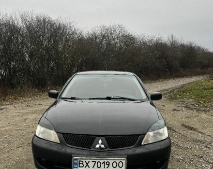 Черный Мицубиси Лансер, объемом двигателя 1.6 л и пробегом 272 тыс. км за 2800 $, фото 1 на Automoto.ua