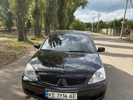 Чорний Міцубісі Lancer, об'ємом двигуна 1.6 л та пробігом 244 тис. км за 4100 $, фото 1 на Automoto.ua