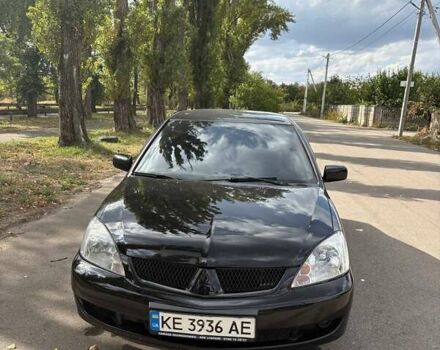 Чорний Міцубісі Lancer, об'ємом двигуна 1.6 л та пробігом 244 тис. км за 4100 $, фото 1 на Automoto.ua
