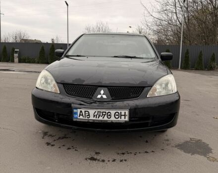 Черный Мицубиси Лансер, объемом двигателя 0 л и пробегом 240 тыс. км за 3300 $, фото 1 на Automoto.ua