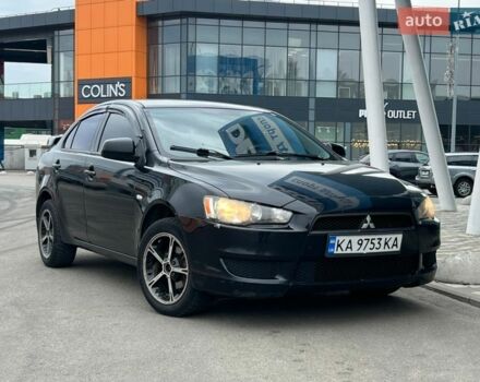 Черный Мицубиси Лансер, объемом двигателя 1.5 л и пробегом 280 тыс. км за 5490 $, фото 1 на Automoto.ua