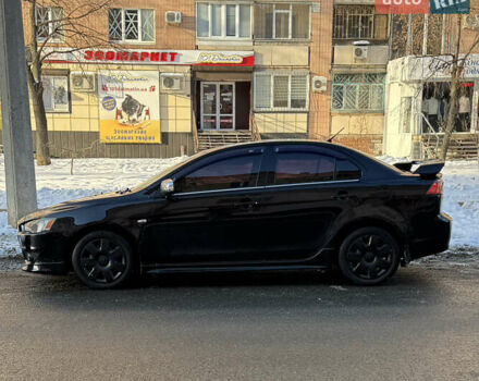 Чорний Міцубісі Lancer, об'ємом двигуна 2 л та пробігом 253 тис. км за 6800 $, фото 1 на Automoto.ua