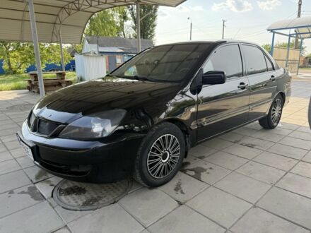 Мицубиси Лансер 2007 в Ахтырке на Automoto.ua Черный Мицубиси Лансер, объемом двигателя 1.6 л и пробегом 100 тыс. км за 3550 $, фото 1 на Automoto.ua