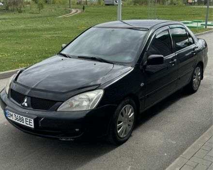 Чорний Міцубісі Lancer, об'ємом двигуна 1.6 л та пробігом 216 тис. км за 4700 $, фото 1 на Automoto.ua