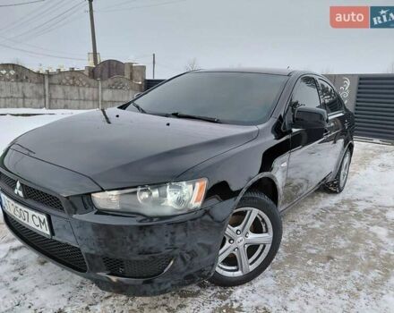 Черный Мицубиси Лансер, объемом двигателя 1.5 л и пробегом 208 тыс. км за 5599 $, фото 1 на Automoto.ua