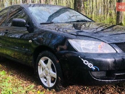 Міцубісі Lancer 2007 у Дунаевцах на Automoto.ua Чорний Міцубісі Lancer, об'ємом двигуна 1.6 л та пробігом 326 тис. км за 3100 $, фото 1 на Automoto.ua