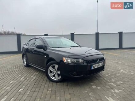 Чорний Міцубісі Lancer, об'ємом двигуна 2 л та пробігом 259 тис. км за 6500 $, фото 1 на Automoto.ua