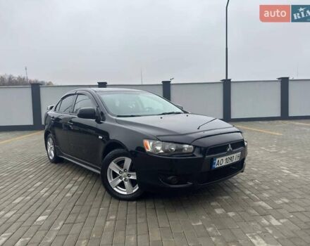 Черный Мицубиси Лансер, объемом двигателя 2 л и пробегом 259 тыс. км за 6500 $, фото 1 на Automoto.ua