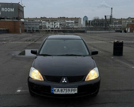 Чорний Міцубісі Lancer, об'ємом двигуна 1.58 л та пробігом 260 тис. км за 3299 $, фото 1 на Automoto.ua