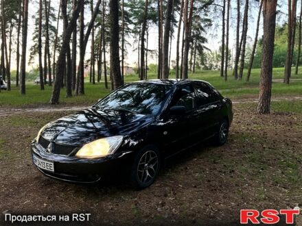 Мицубиси Лансер 2007 в Сумах на Automoto.ua Черный Мицубиси Лансер, объемом двигателя 1.6 л и пробегом 224 тыс. км за 4500 $, фото 1 на Automoto.ua