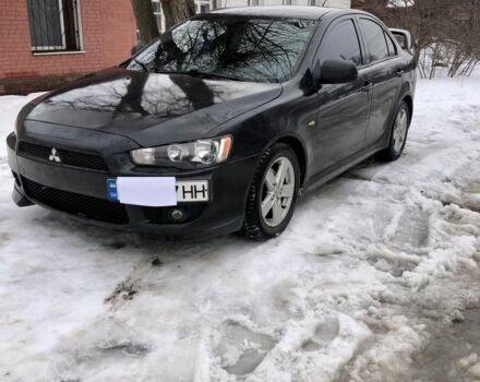 Черный Мицубиси Лансер, объемом двигателя 2 л и пробегом 290 тыс. км за 3900 $, фото 1 на Automoto.ua