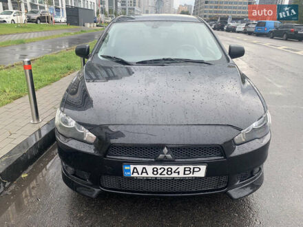 Черный Мицубиси Лансер, объемом двигателя 2 л и пробегом 354 тыс. км за 5650 $, фото 1 на Automoto.ua