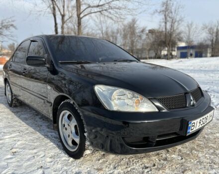 Черный Мицубиси Лансер, объемом двигателя 1.6 л и пробегом 181 тыс. км за 4350 $, фото 1 на Automoto.ua