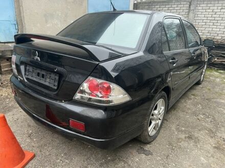 Міцубісі Lancer 2007 у Харкові на Automoto.ua Чорний Міцубісі Lancer, об'ємом двигуна 2 л та пробігом 140 тис. км за 1350 $, фото 1 на Automoto.ua