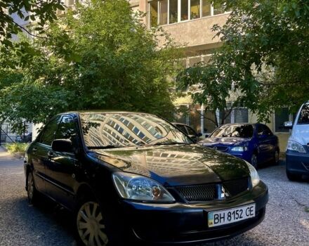 Чорний Міцубісі Lancer, об'ємом двигуна 1.6 л та пробігом 230 тис. км за 3200 $, фото 1 на Automoto.ua
