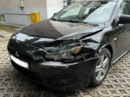 Чорний Міцубісі Lancer, об'ємом двигуна 2 л та пробігом 245 тис. км за 3500 $, фото 1 на Automoto.ua
