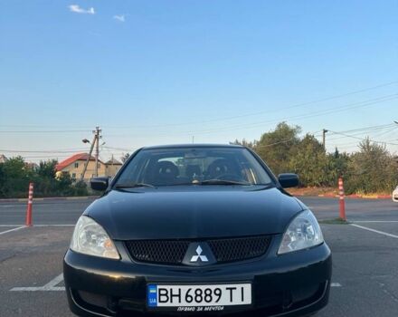 Чорний Міцубісі Lancer, об'ємом двигуна 1.6 л та пробігом 305 тис. км за 4900 $, фото 1 на Automoto.ua