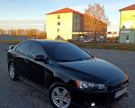 Черный Мицубиси Лансер, объемом двигателя 2 л и пробегом 280 тыс. км за 6900 $, фото 1 на Automoto.ua