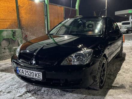 Чорний Міцубісі Lancer, об'ємом двигуна 1.58 л та пробігом 307 тис. км за 3700 $, фото 1 на Automoto.ua