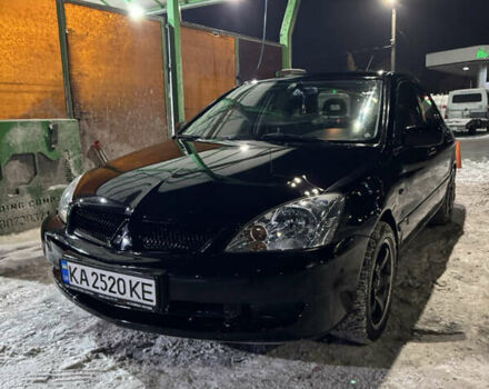 Чорний Міцубісі Lancer, об'ємом двигуна 1.58 л та пробігом 307 тис. км за 3700 $, фото 1 на Automoto.ua
