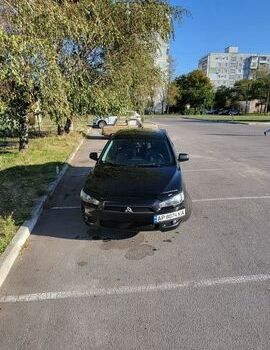 Черный Мицубиси Лансер, объемом двигателя 2 л и пробегом 263 тыс. км за 5300 $, фото 1 на Automoto.ua