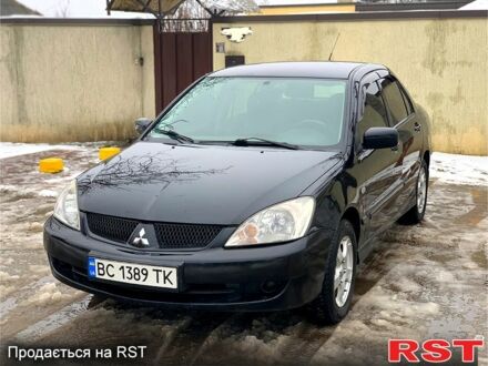 Черный Мицубиси Лансер, объемом двигателя 1.6 л и пробегом 180 тыс. км за 3800 $, фото 1 на Automoto.ua