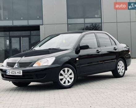 Чорний Міцубісі Lancer, об'ємом двигуна 1.6 л та пробігом 243 тис. км за 4950 $, фото 1 на Automoto.ua