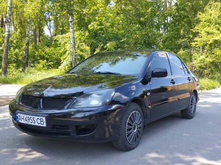 Чорний Міцубісі Lancer, об'ємом двигуна 1.6 л та пробігом 230 тис. км за 3750 $, фото 1 на Automoto.ua