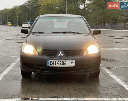 Чорний Міцубісі Lancer, об'ємом двигуна 1.6 л та пробігом 200 тис. км за 3900 $, фото 1 на Automoto.ua
